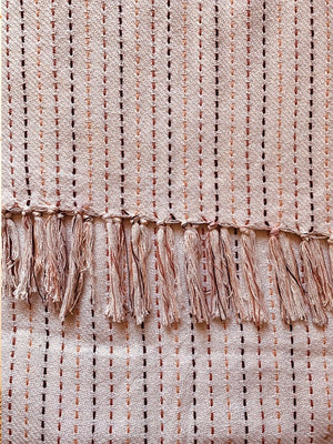 Stripe pattern throw in white pink with tassels